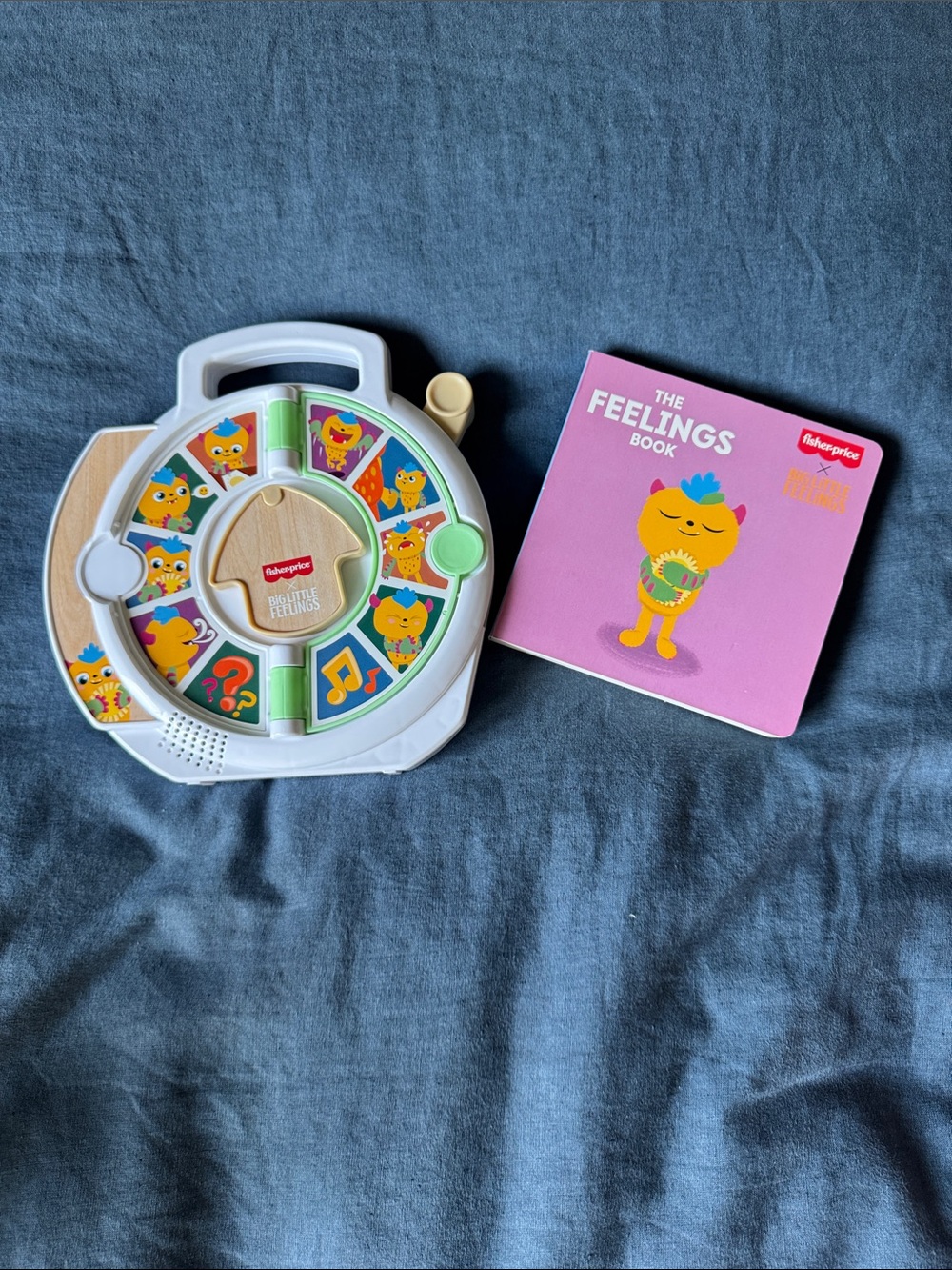 Fisher-Price Big Little Feelings Board Book with l Interactive Spinner